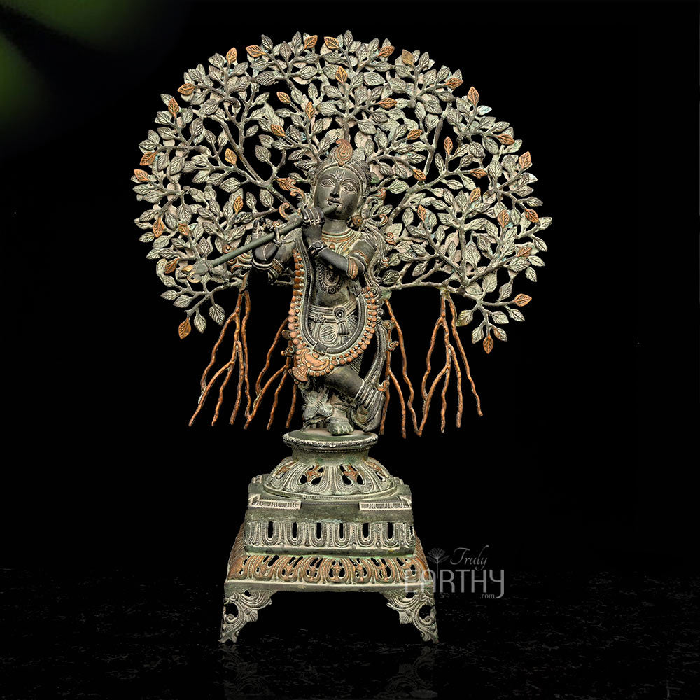 brass krishna sculpture