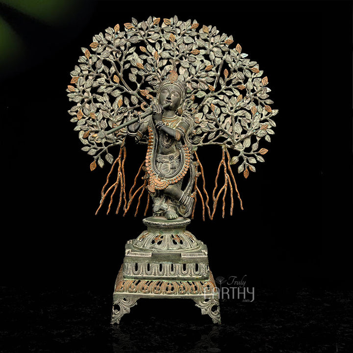 brass krishna sculpture