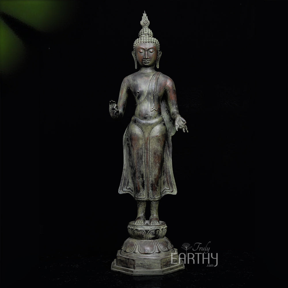 bronze standing buddha statue