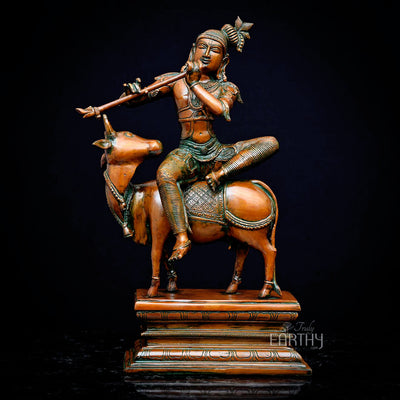 brass krishna idol