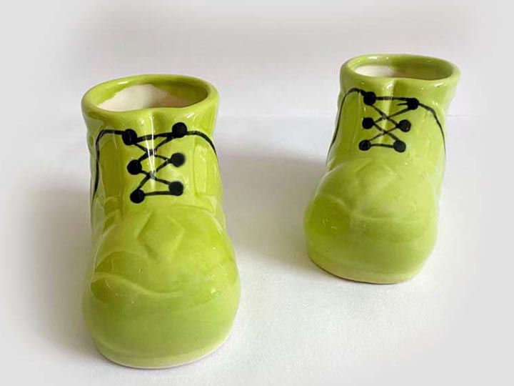 alt="green shoes planter"