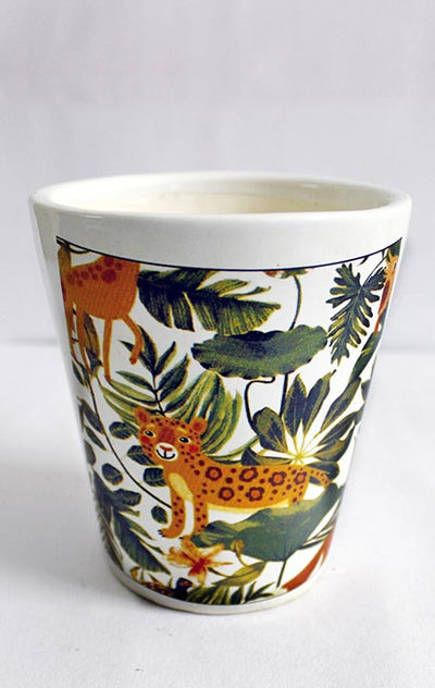 alt="jungle leopard ceramic planter"