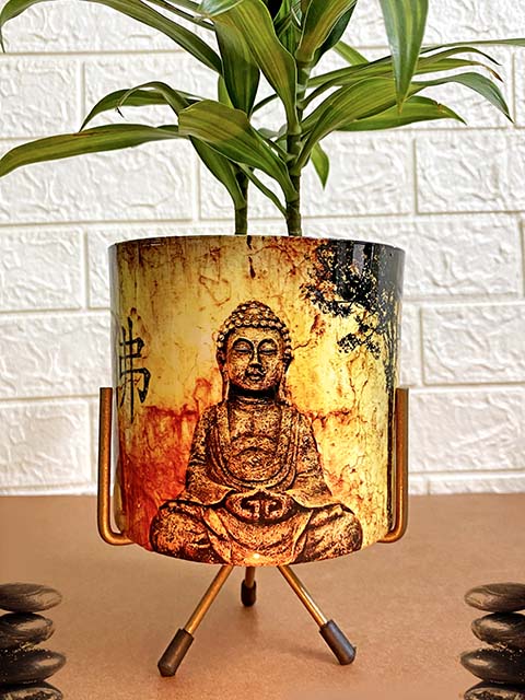 alt="meditating buddha pot"